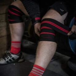 Harbinger Red Line Knee Wraps -Fitness Equipment Shop 9a1756fd0c741126d7bbd4b692ccbd91 5d0a752575de5 600x600 1